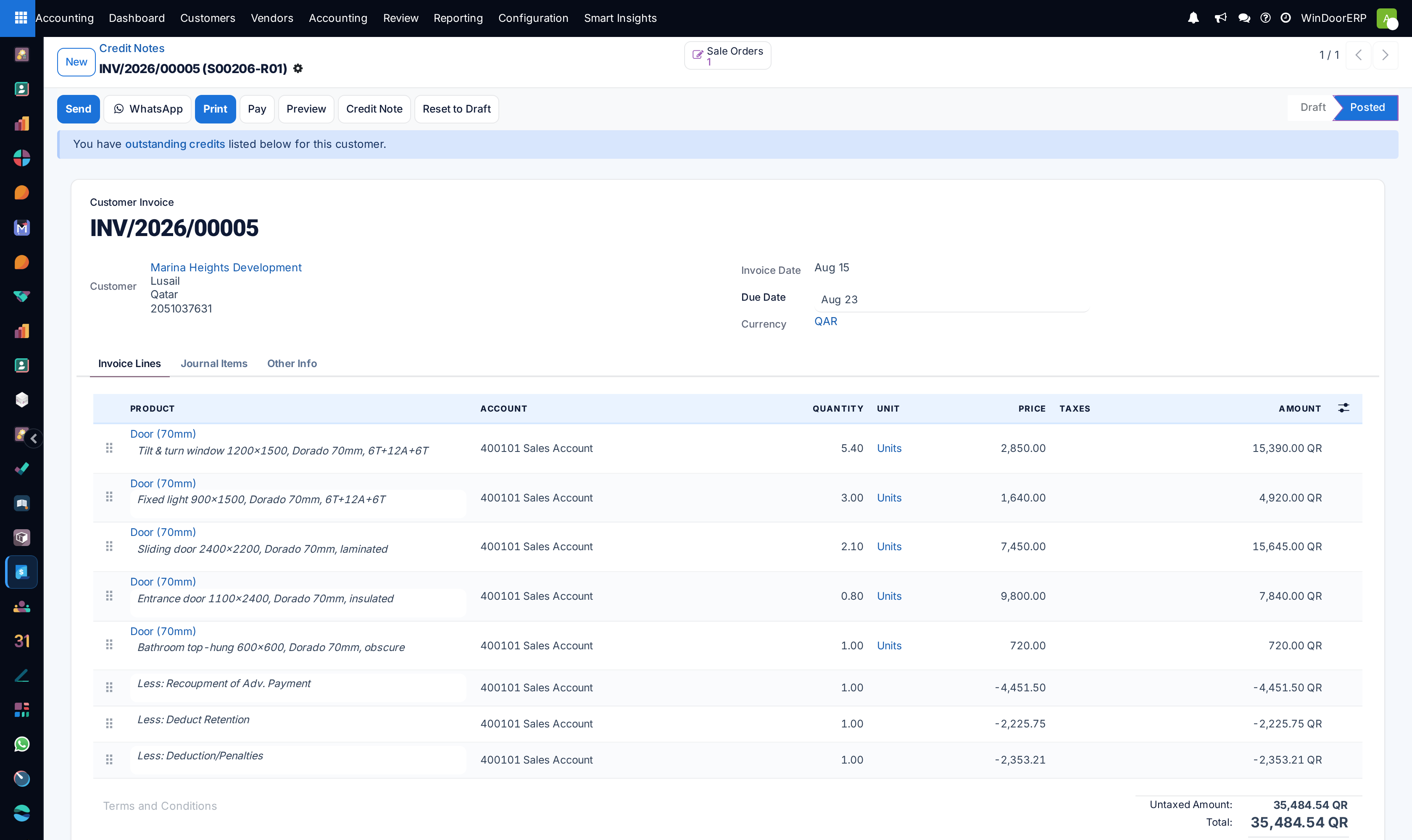 Customer credit note detail form with reverse journal lines and refund reasons