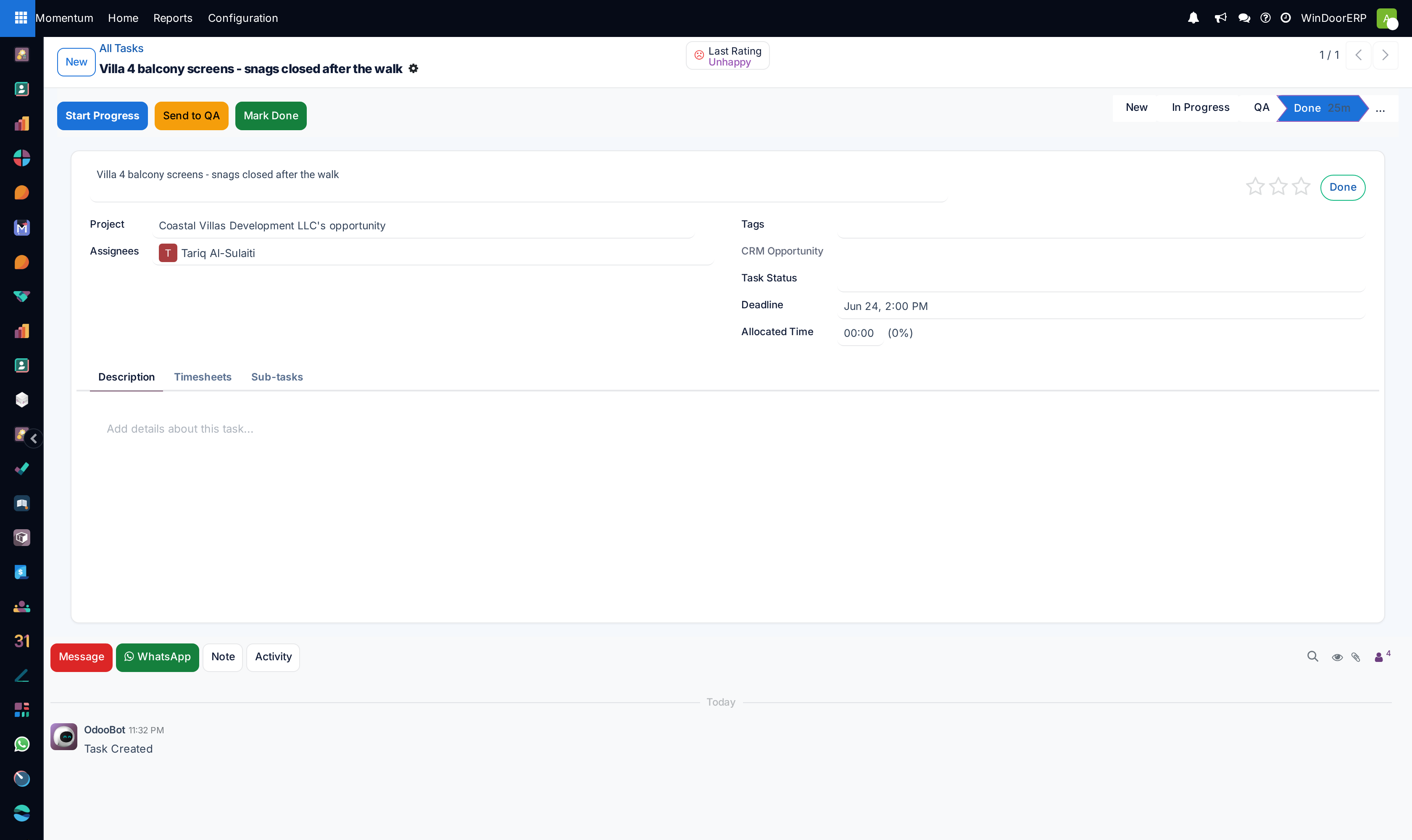 Task detail form with checklists, attachments, logged hours, and sub-tasks