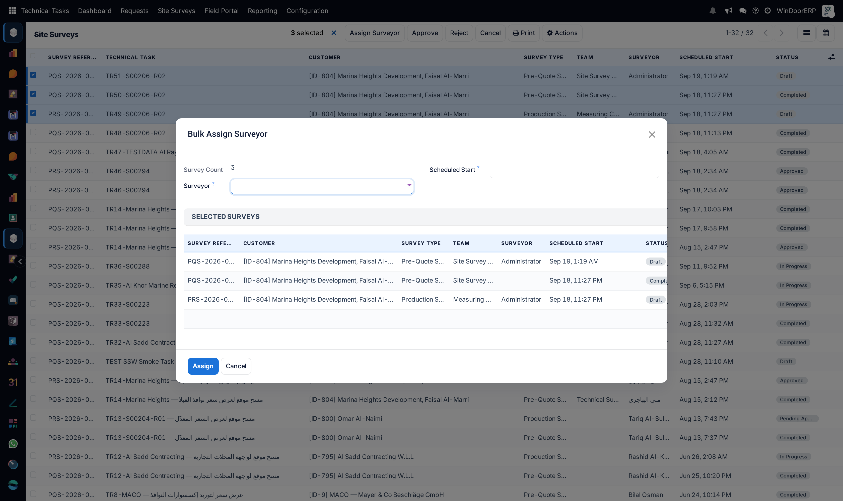 The Bulk Assign Surveyor dialog over the survey list: the survey count, an empty Surveyor field, an optional Scheduled Start and the three selected surveys with their customer, type, team, surveyor, scheduled start and status